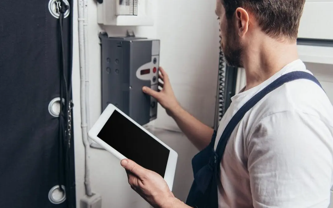inspector prepares a home inspection report